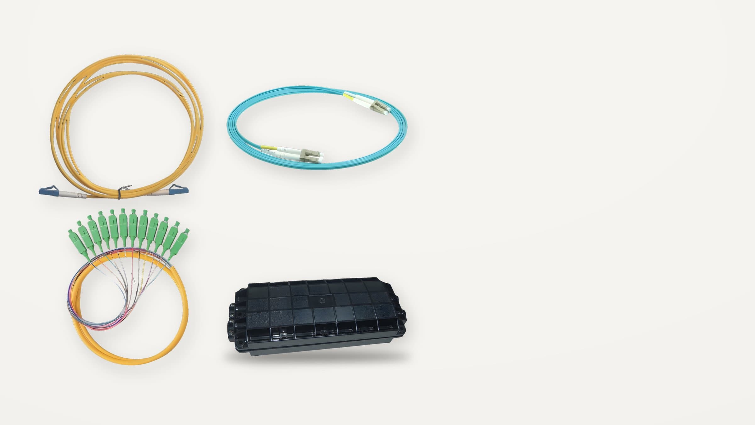 Fiber patch cords, pigtails, and a splice closure.